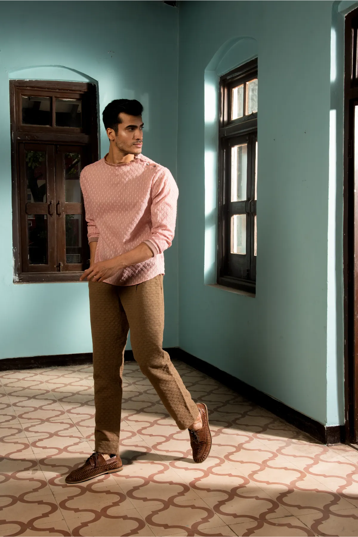 Salmon tunic with dark beige trousers